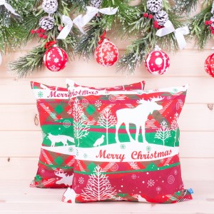 Poszewka świąteczna 40x40 cm wzór 4 Białe renifery na czerwono-zielonym tle
