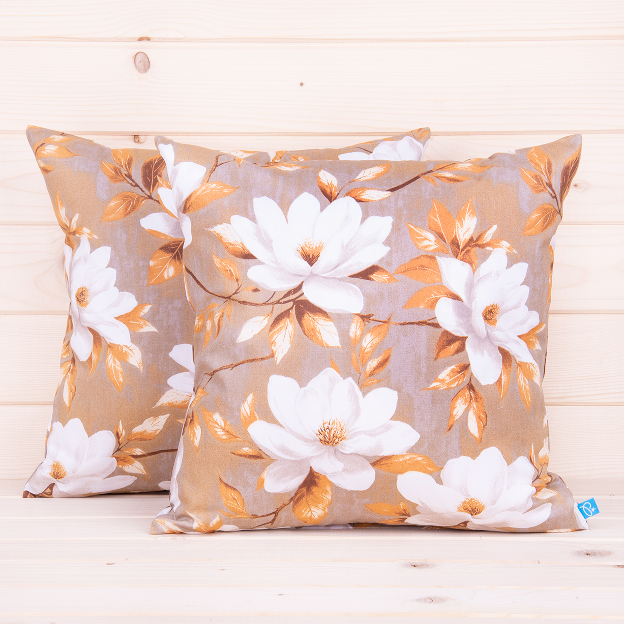 Poszewka z bawełny 40x40 cm Kwiat magnolii na beżowoszarym tle